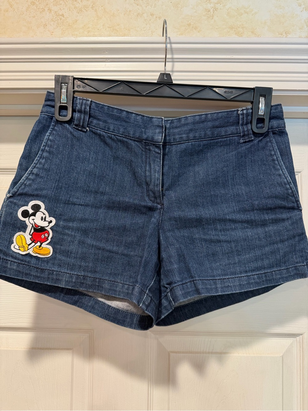 New York & Company Dark Blue Denim Shorts with Mickey Appliqué.